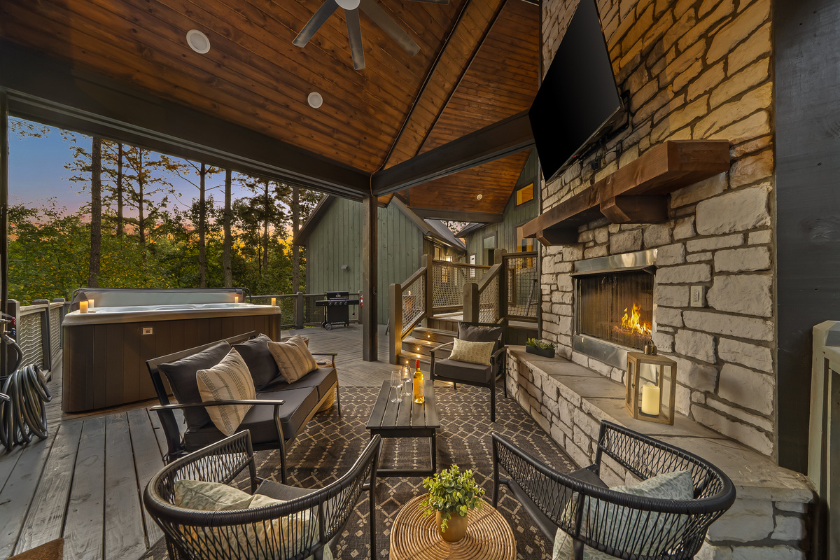 Soak beneath the pines or settle in by the outdoor fireplace. This covered deck was made for slow evenings together.