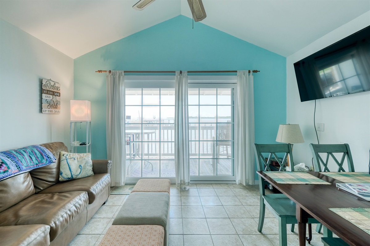 Large sliding glass doors lead to porch