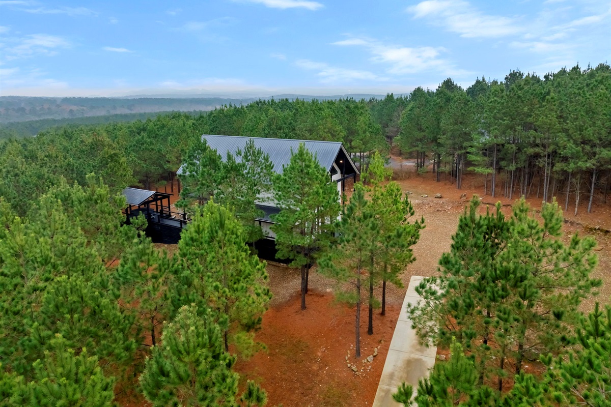 Paved drive way up to the private wooded lot 🌲✨ Bring your trailers with toys.