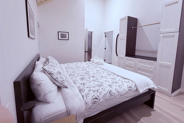 Another view of the primary bedroom with KING size bed