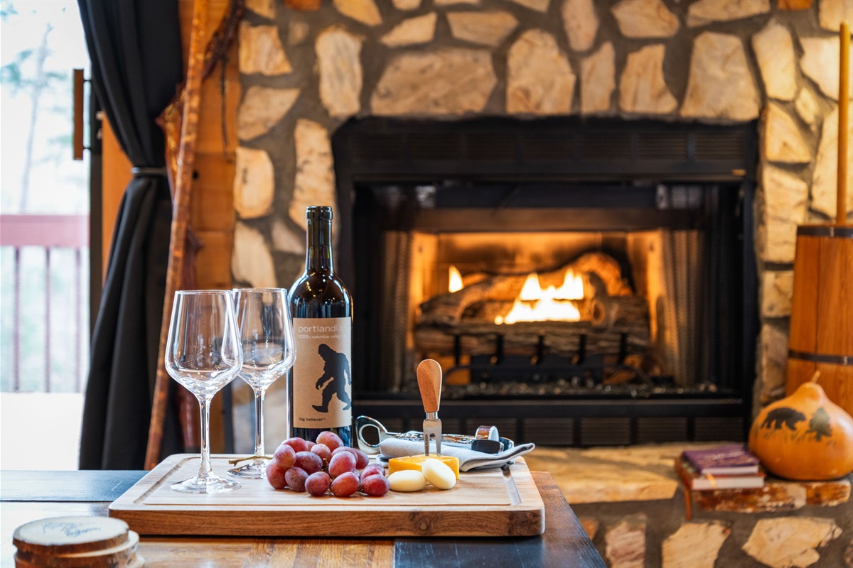 A cozy fireplace serves as the focal point, adding both charm and warmth.