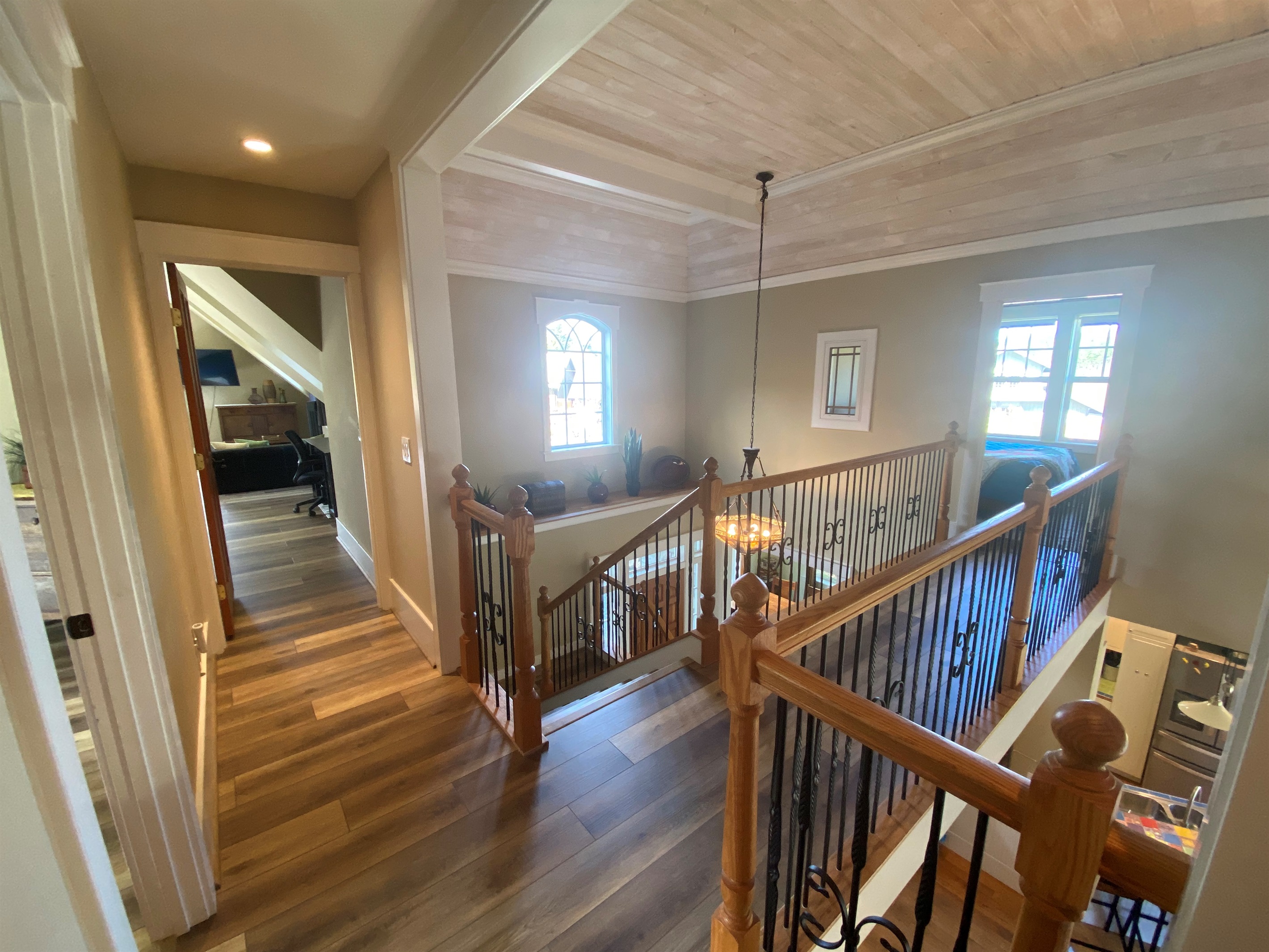 Taken from the kids playroom, a king bedroom is to your right, the large bonus room straight ahead and to your left down the sky bridge is the Queen bedroom. 