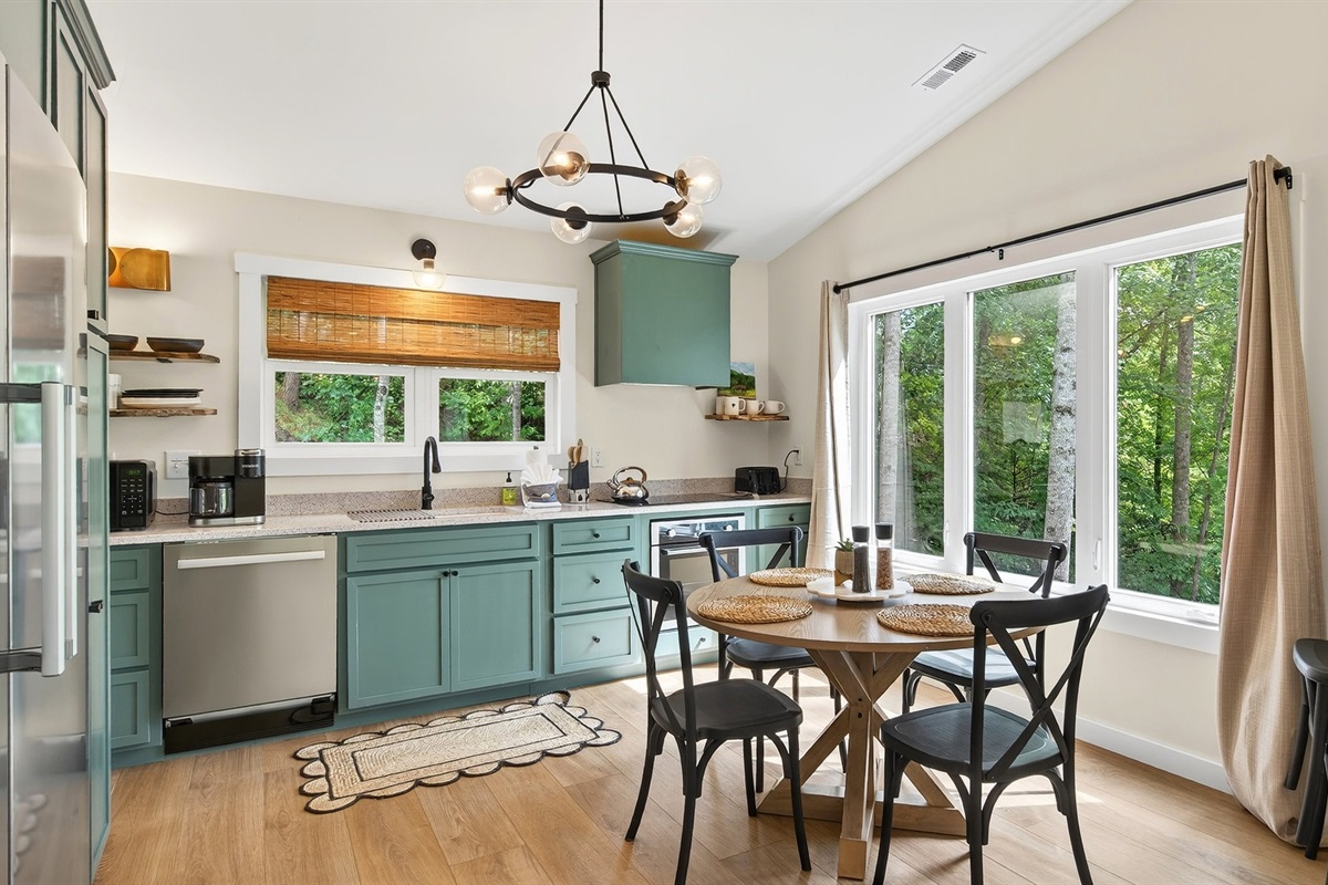 Large windows in the kitchen let in natural light