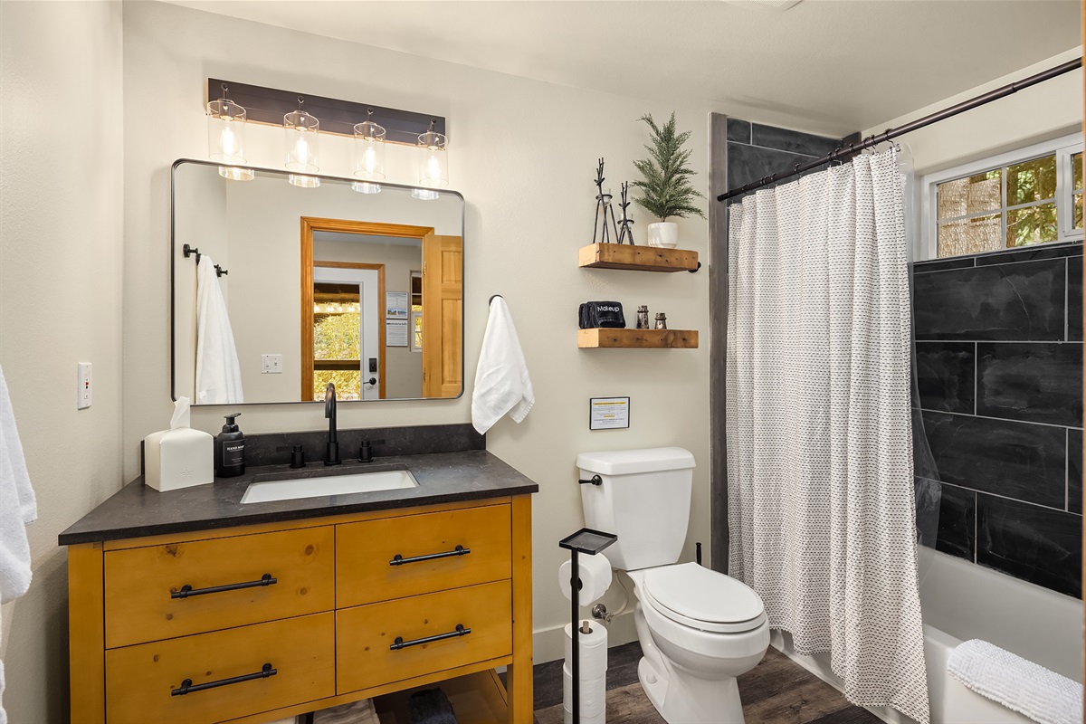 Bathroom #1: main floor with tub/shower combo