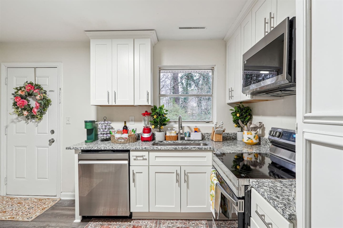 Enjoy a fully equipped kitchen featuring a dishwasher, oven, stove,fridge, microwave, sink, toaster, and coffee maker. It also comes stocked with glasses, cooking utensils, pots, pans, spoons, forks,... 