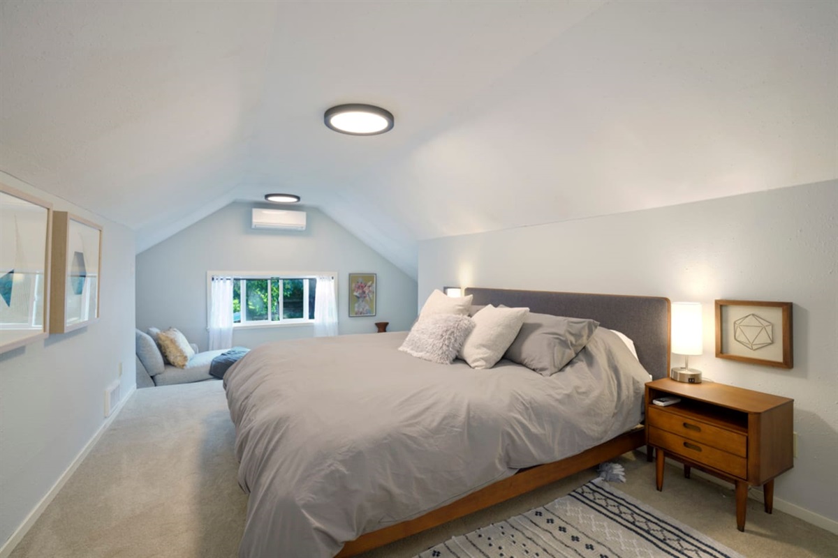 upstairs king bed in master.  with sitting area and AC