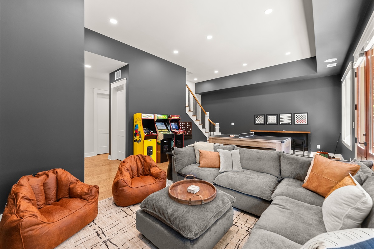 Movie & game room with plush seating — perfect for movie nights and tournaments.