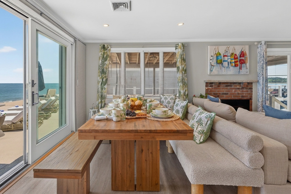 Share meals in a bright, inviting space with comfortable seating and coastal touches.