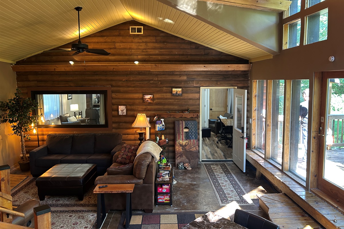 Window between sunroom into Guest Quarters helps you see what's going on in the space.