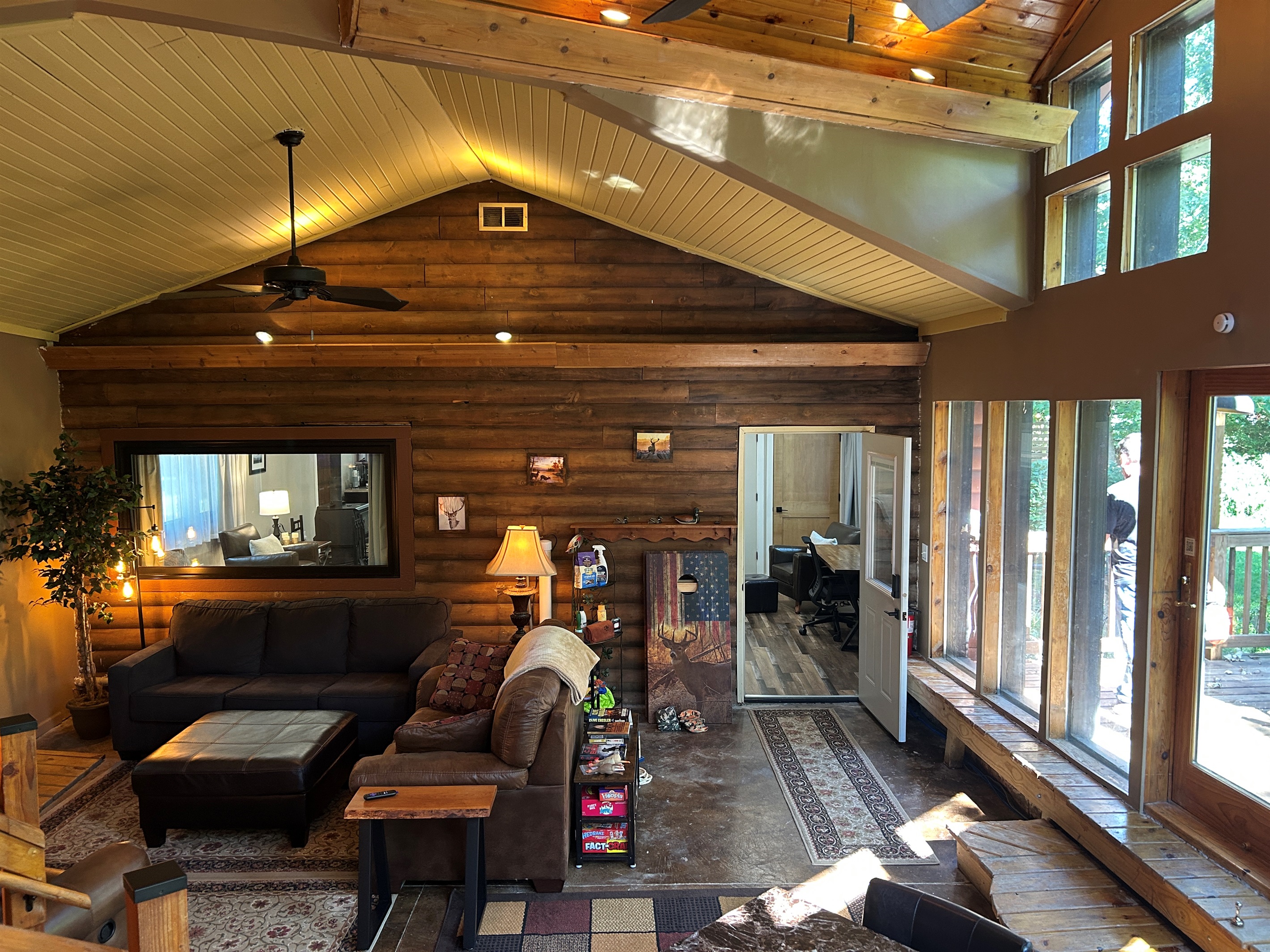 Window between sunroom into Guest Quarters helps you see what's going on in the space.