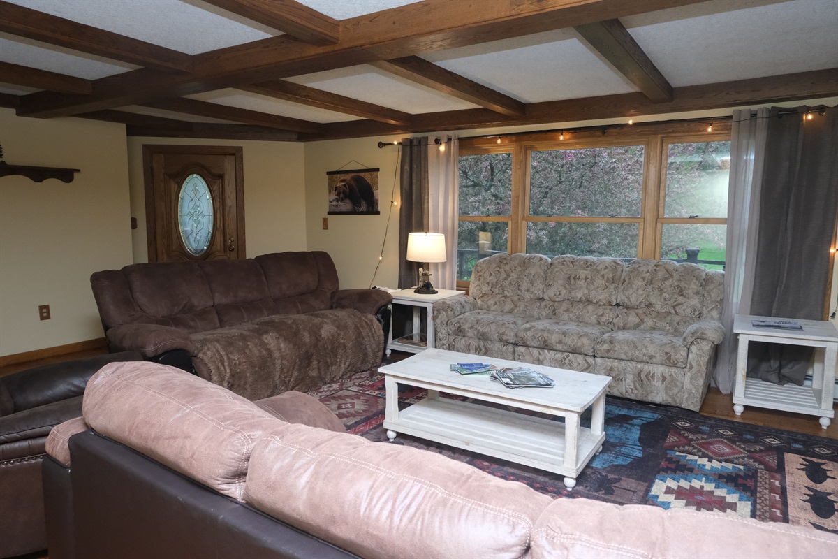 Living Room area - there's always room for one more with these comfy sofas!