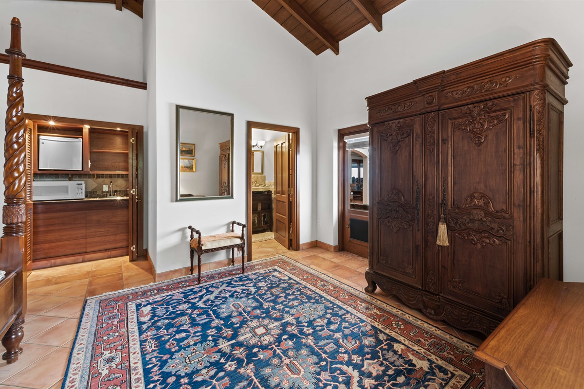 This bedroom suite has a small kitchenette and an ensuite bathroom.