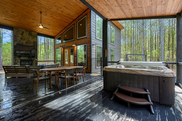 Al fresco dining, grill with propane, and hot tub all under  extra large covered porch