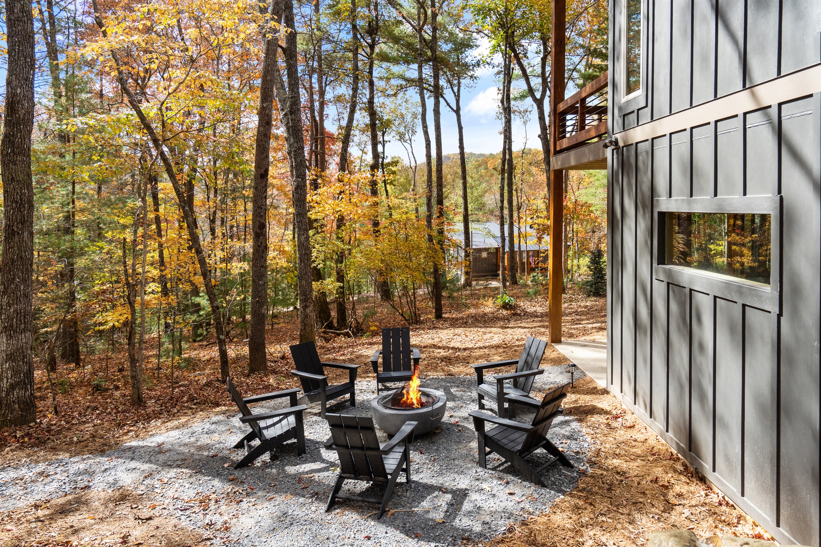 Walk out to the modern firepit and connecting horseshoe pit