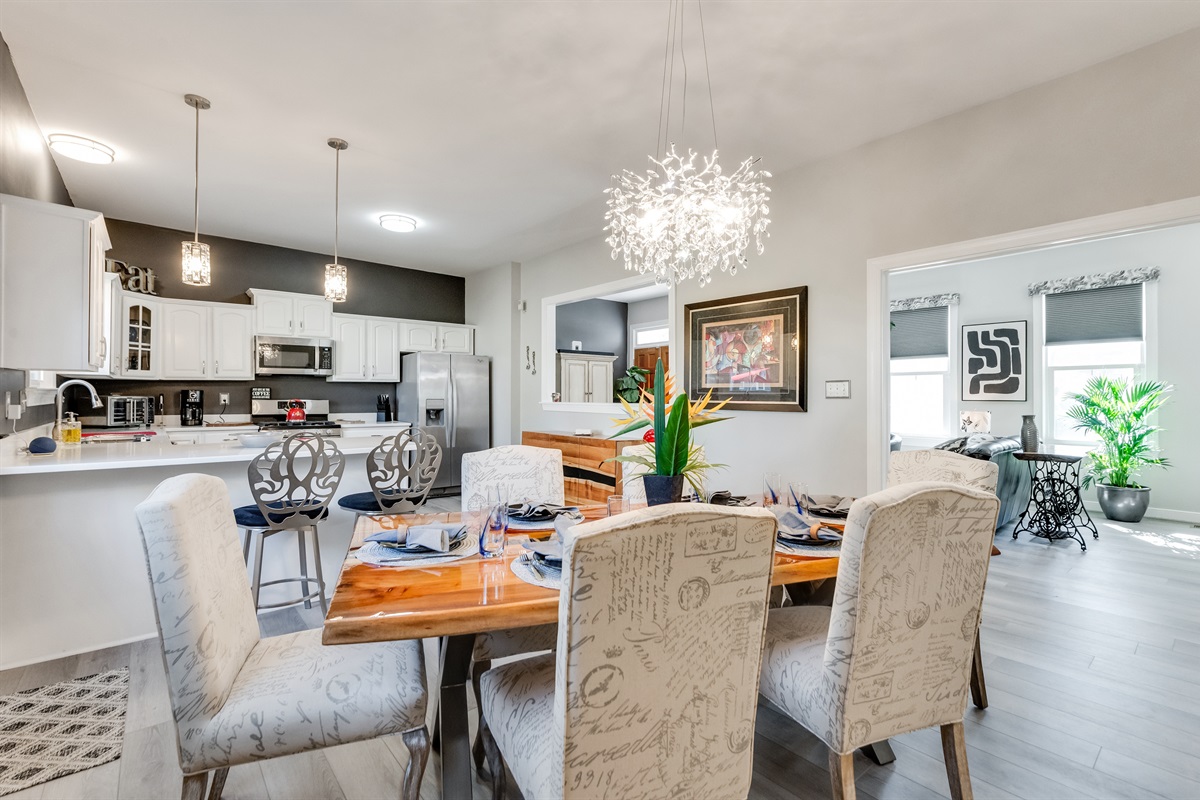 Dining Room: Chic decor and modern lighting create a vibrant space for memorable meals!