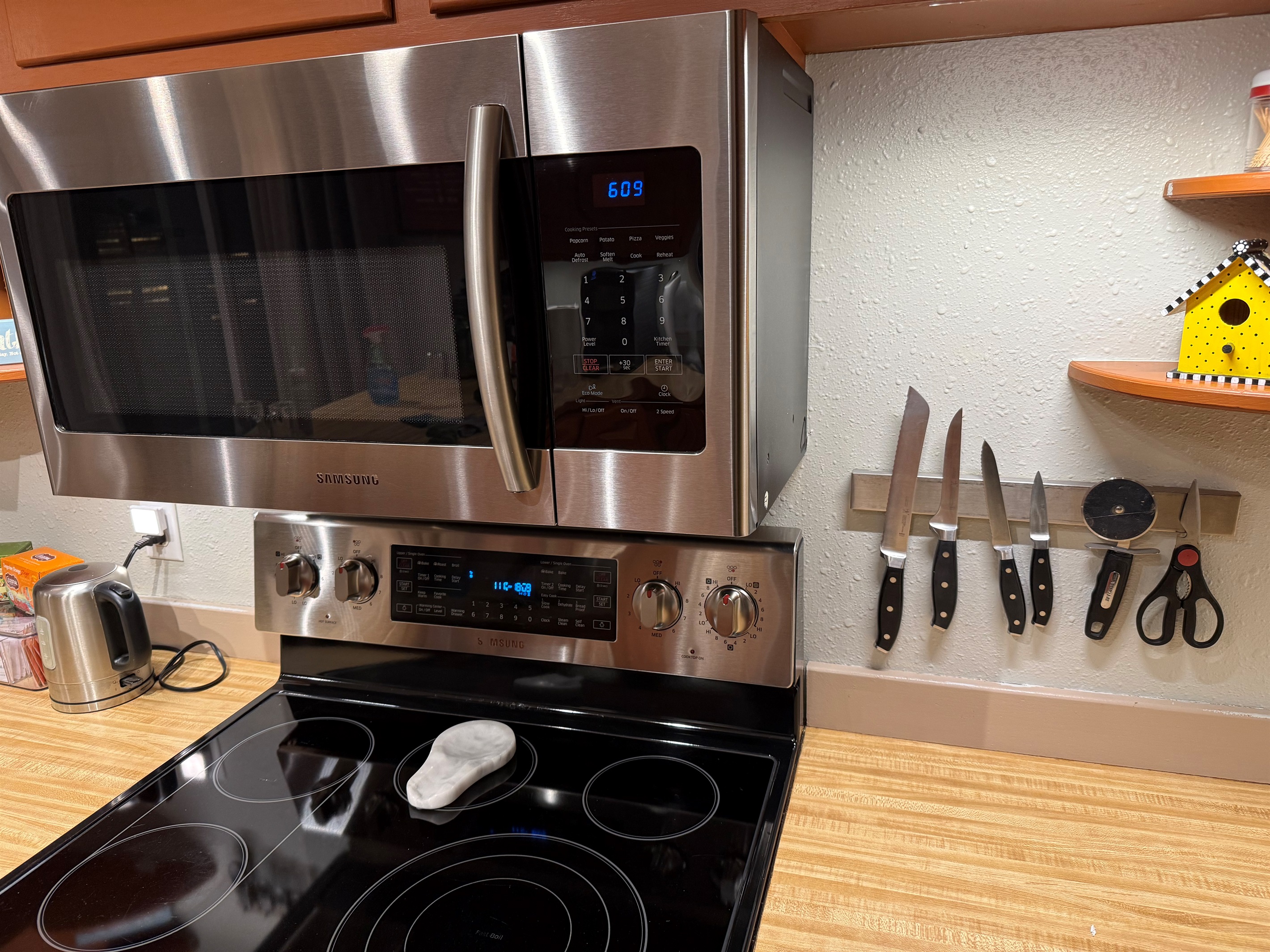 Microwave, stove and tea kettle