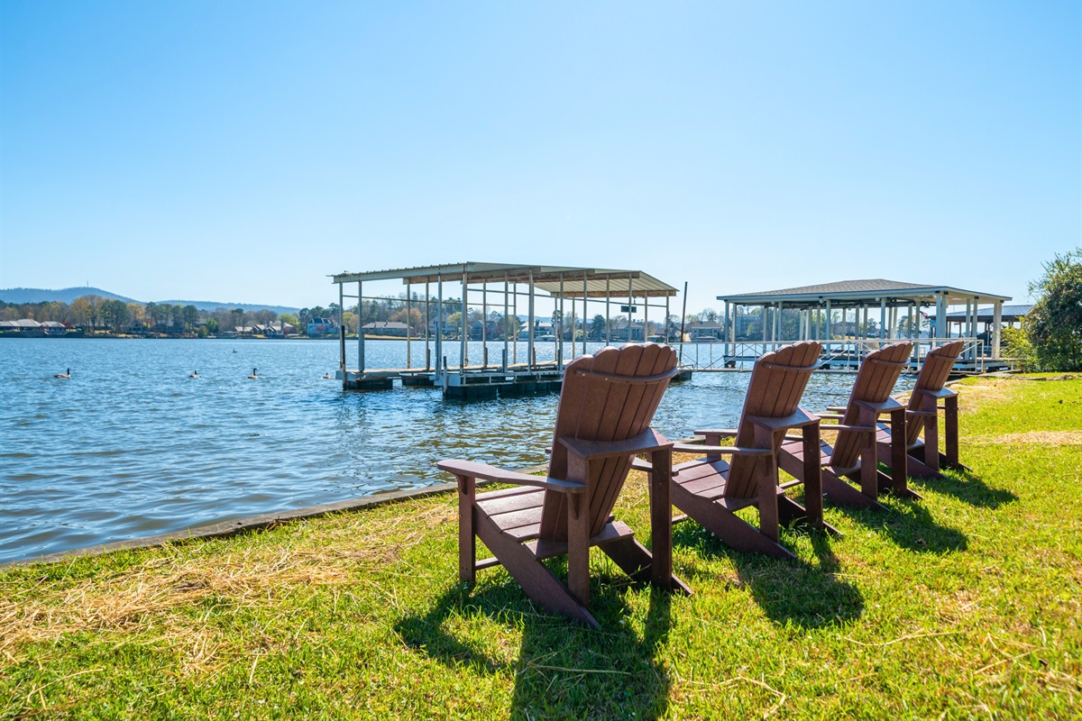 Settle into the Adirondack chairs and enjoy uninterrupted views of the lake, perfect for slow mornings or sunset watching.