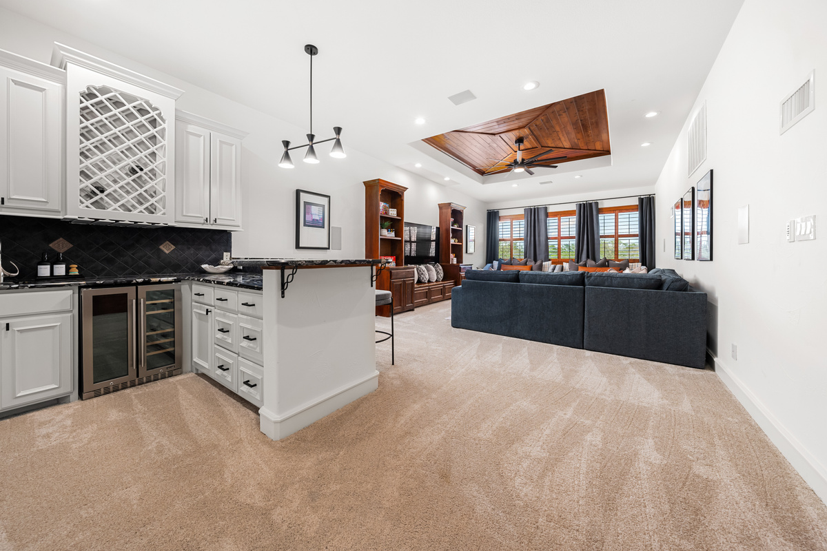 A stylish bar area adjacent to the living space, perfect for relaxing and entertaining.
