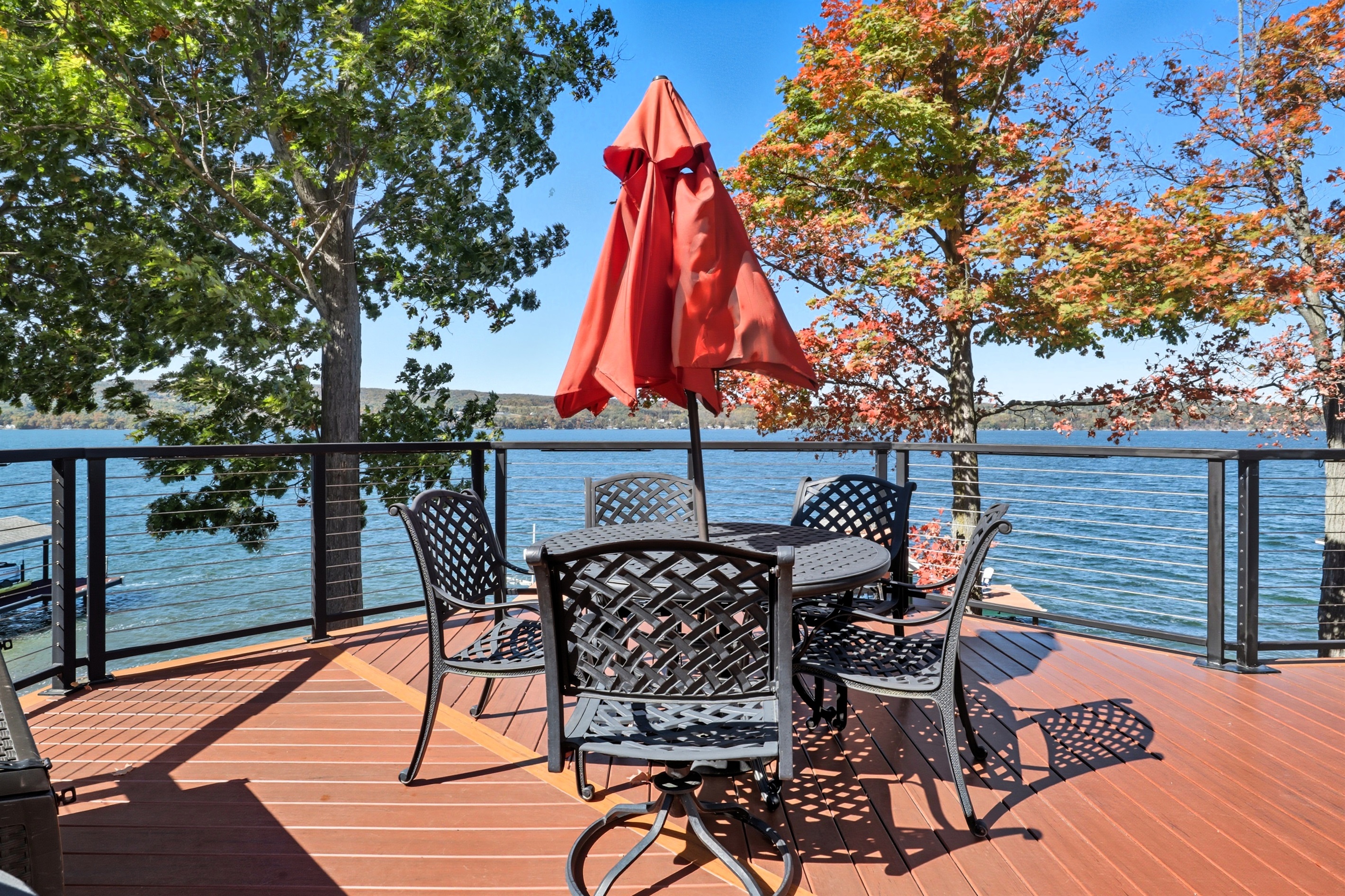 Outdoor dining on the main deck overlooking the water.