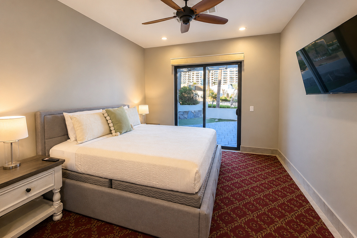 Casita 1: This private guest casita features a king-size bed, Smart TV, ceiling fan, and direct patio access.