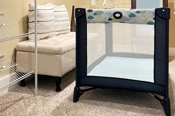 This is the master bedroom closet, we store the travel bassinet here. 