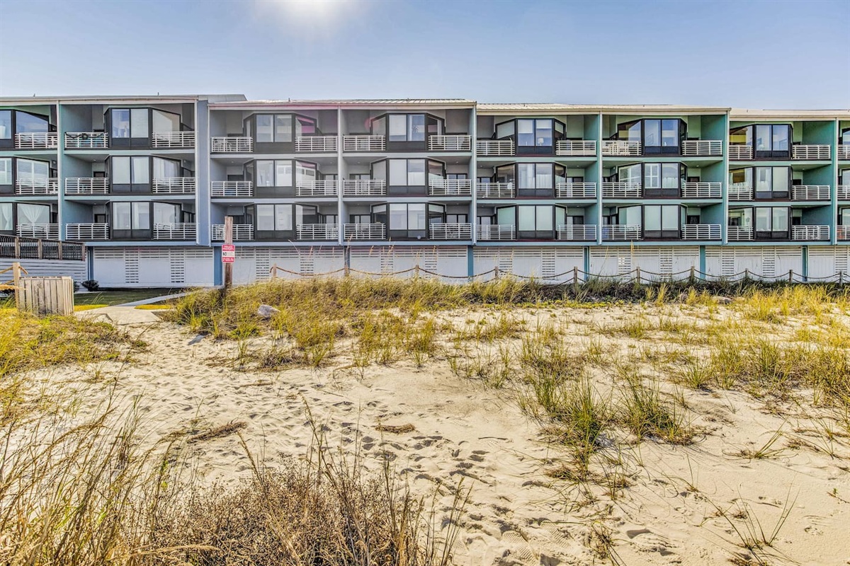 View of the building from the beach on the sound