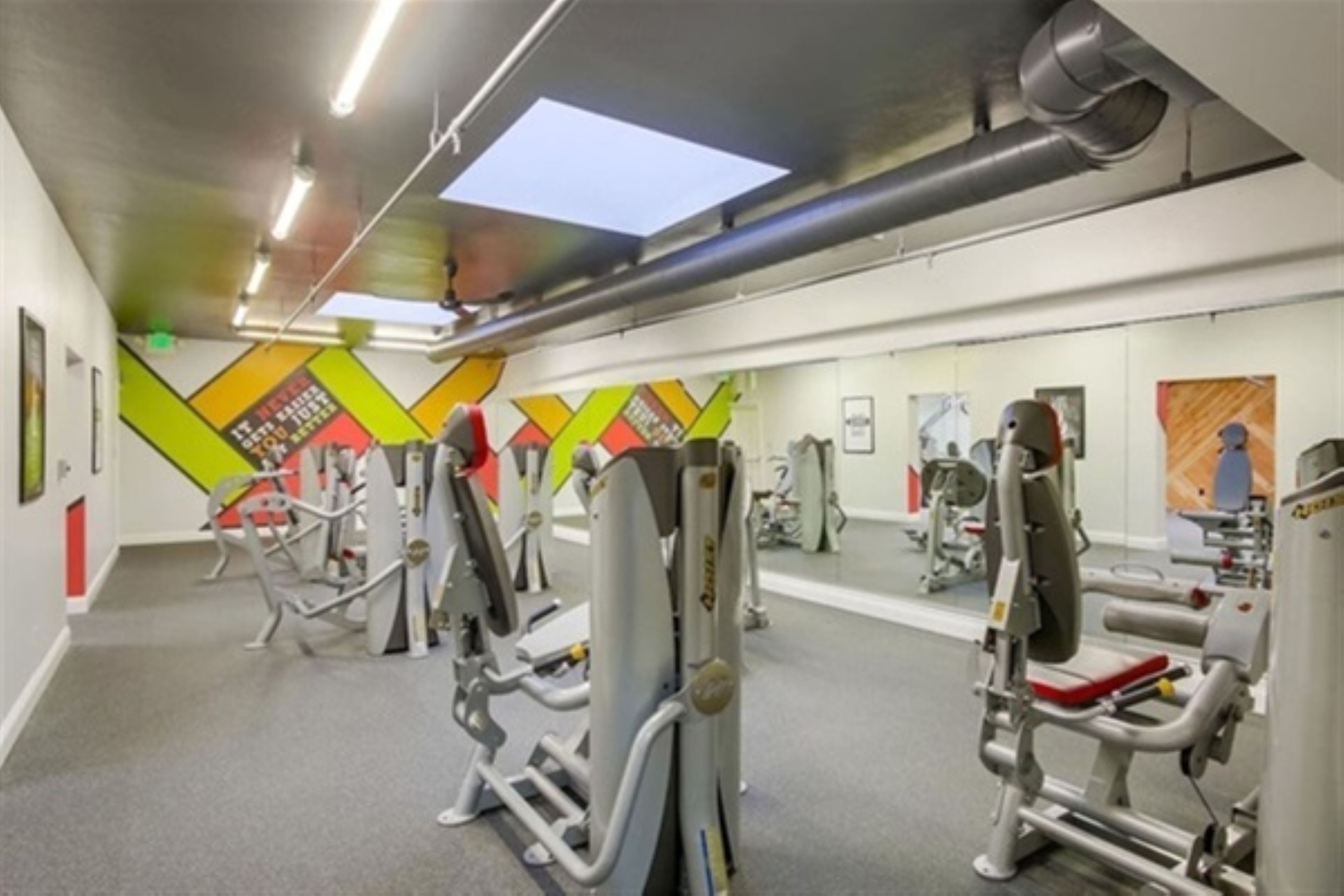 Spacious, mirrored, air-conditioned fitness center