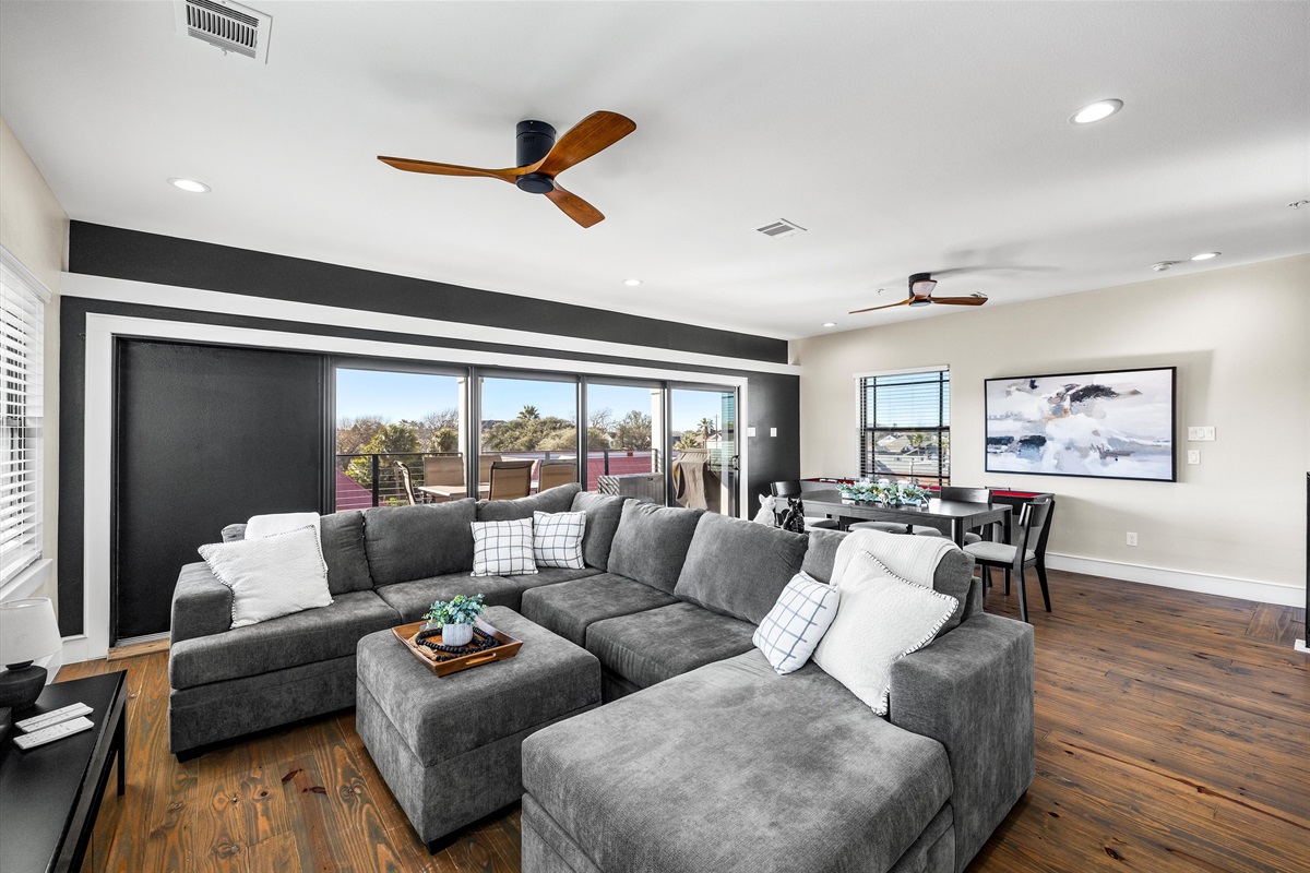 Living Area: Spacious retreat with light-filled views and chic furnishings for memorable gatherings!