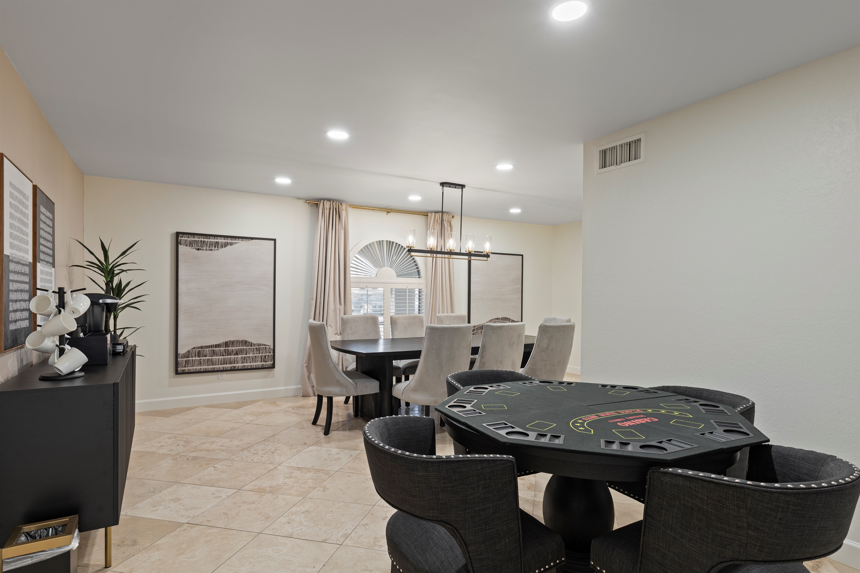 Dining and game area with space for cards, games, or casual gatherings
