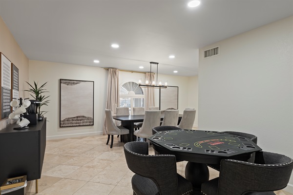 Dining and game area with space for cards, games, or casual gatherings
