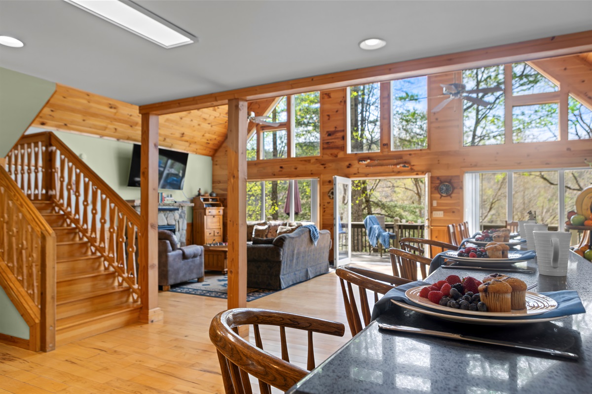 Dining & Living Area: Bright space with wooden details and stunning views for unforgettable gatherings!