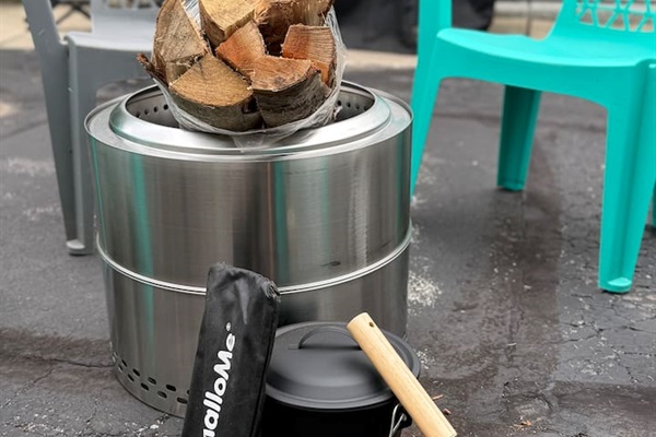 Smokeless firepit with 1 bundle of wood provided. Marshmallow sticks available for s’mores.
Ash bucket and firepit cover for easy and safe cleanup. Firepit and supplies stored under the porch.