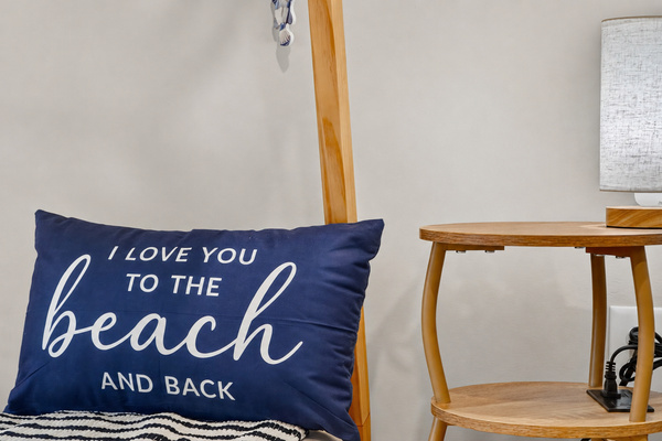 Charming beach-inspired details bring a playful coastal feel to the room.