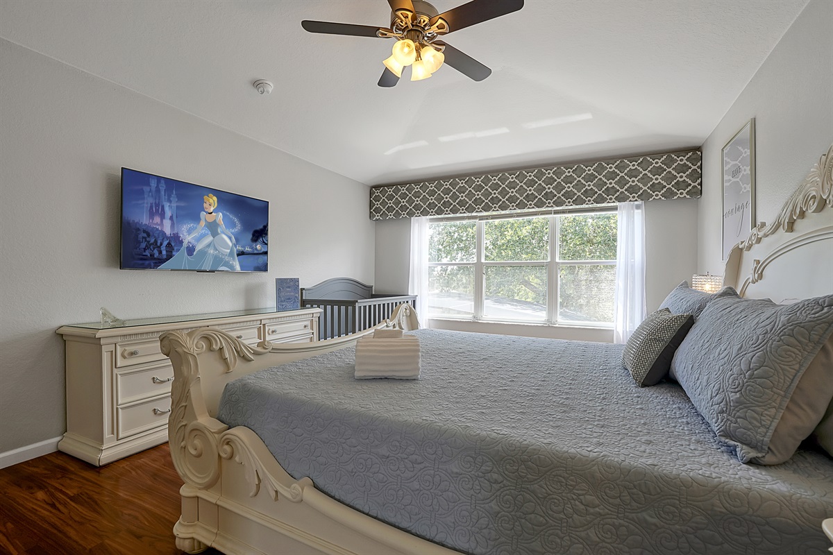 Gorgeous, giant windows let the natural light stream in. For the littlest princes and princesses, a full size crib and a white noise machine -that also serves as a bluetooth speaker- ensure a good night&rsquo;s sleep for all. A 55&rdquo; Roku TV is also provided.