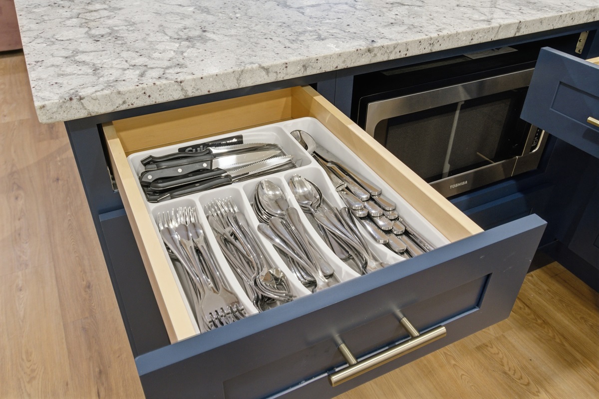 Fully stocked silverware and utensil drawers. Everything included for group cooking and game day meals.