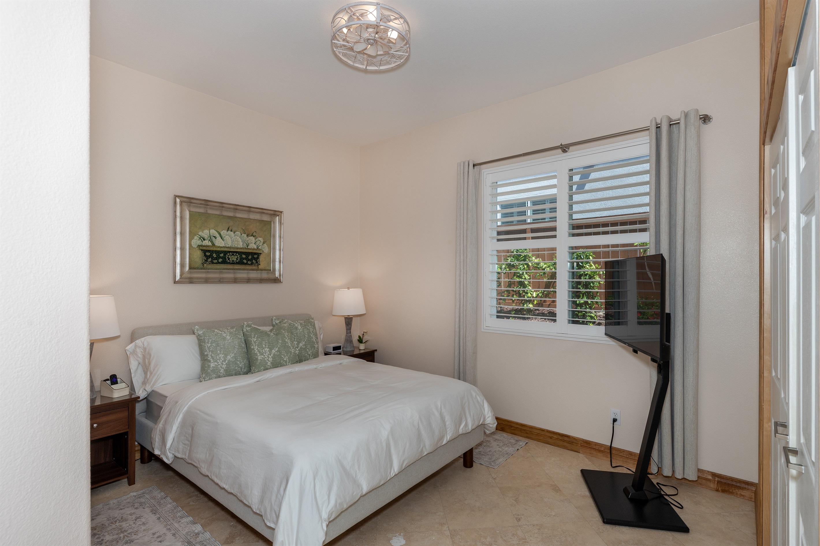 Bright and relaxing bedroom with queen bed and natural light