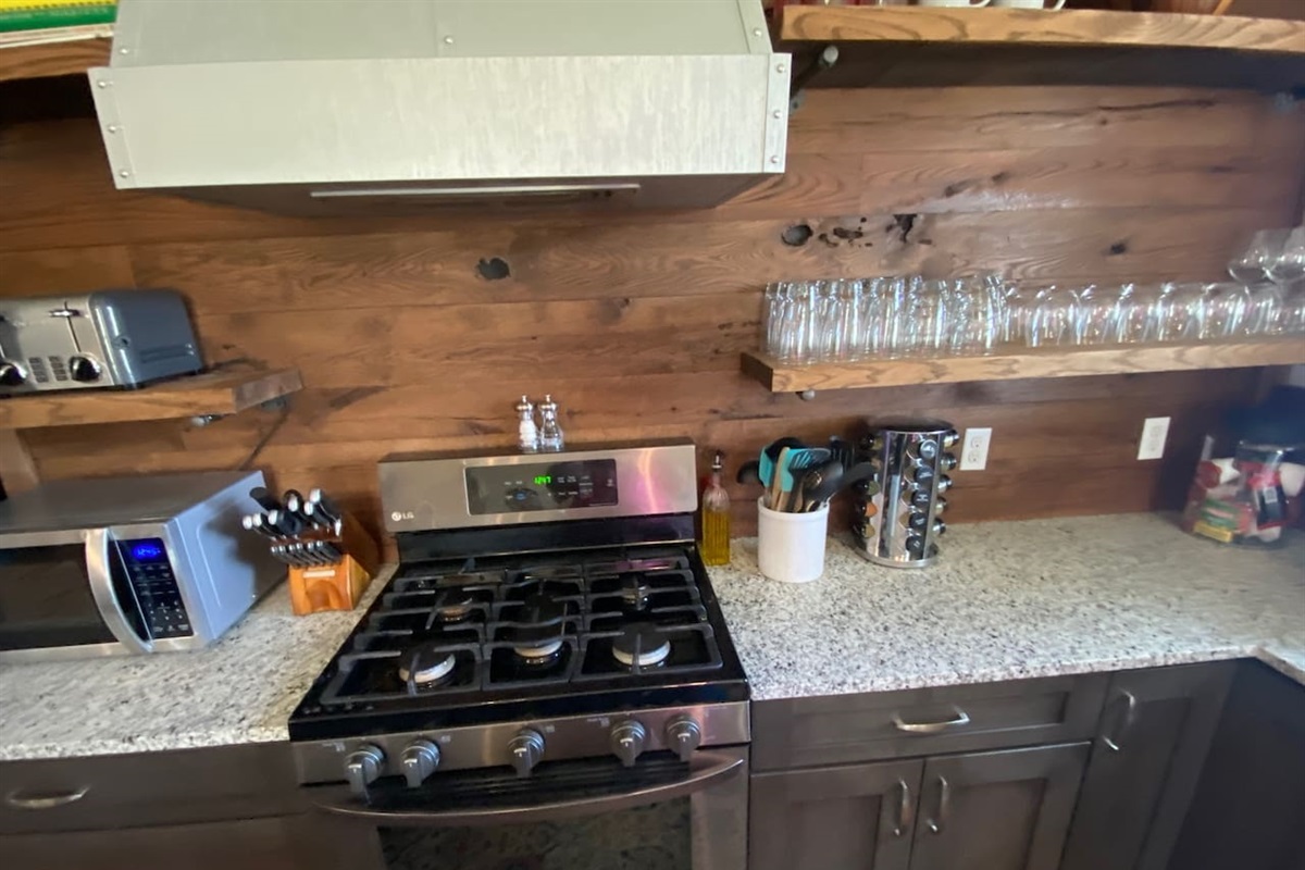 Gas stove, toaster and microwave.