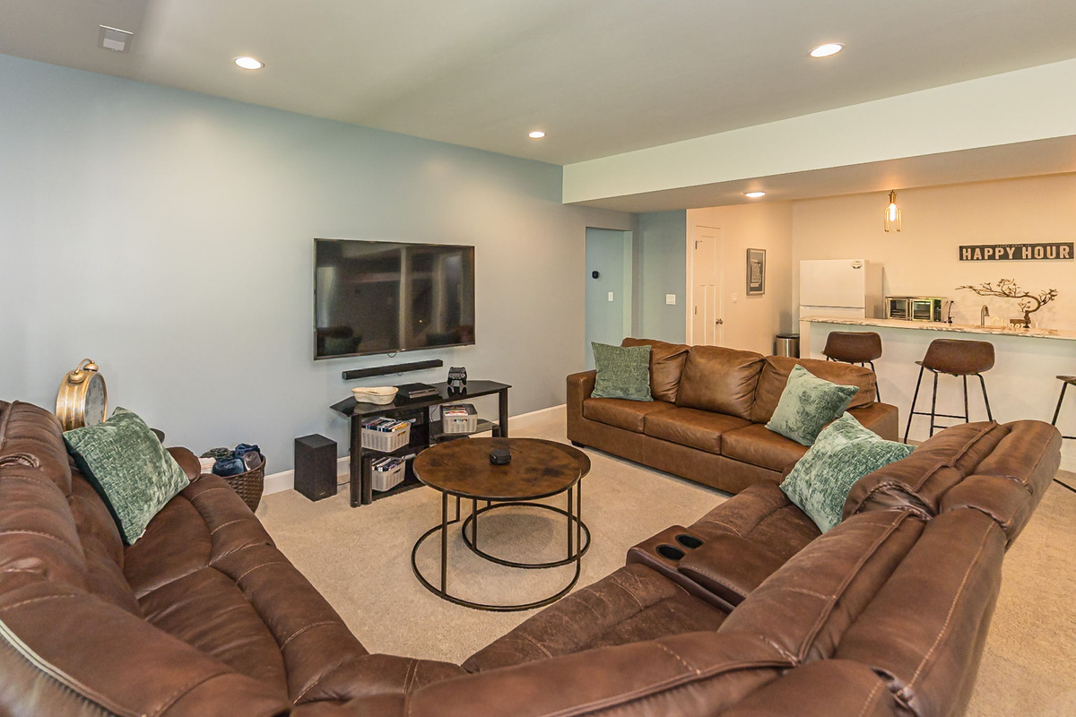Comfortable seating makes the lower level a great second gathering space.