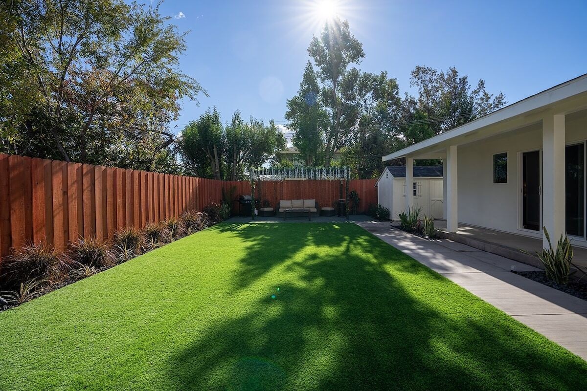 Enjoy the day or night in our spacious backyard