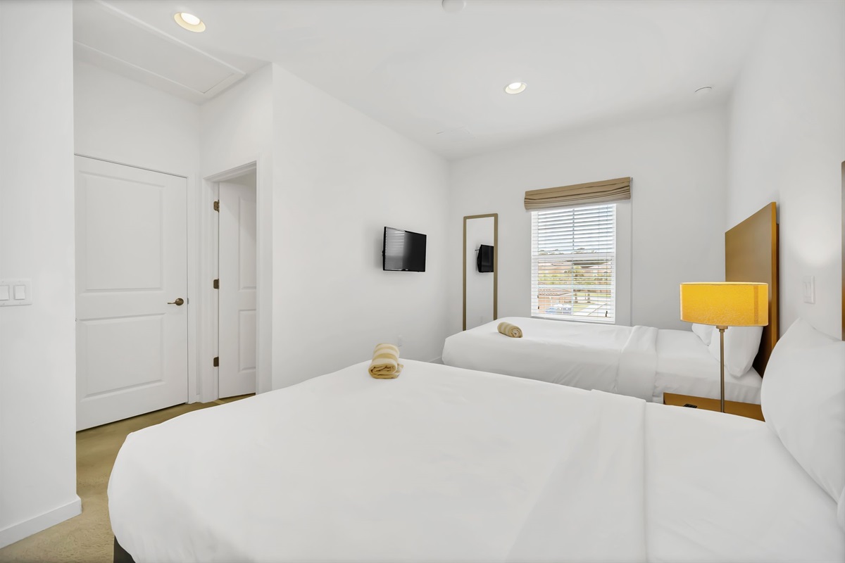 Guest bedroom with 2 full beds.