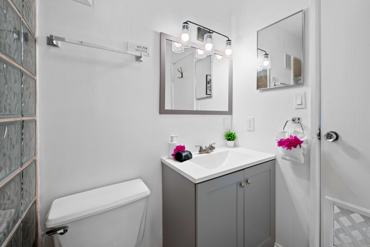 Clean, stylish finishes create a relaxing and functional guest bathroom.
