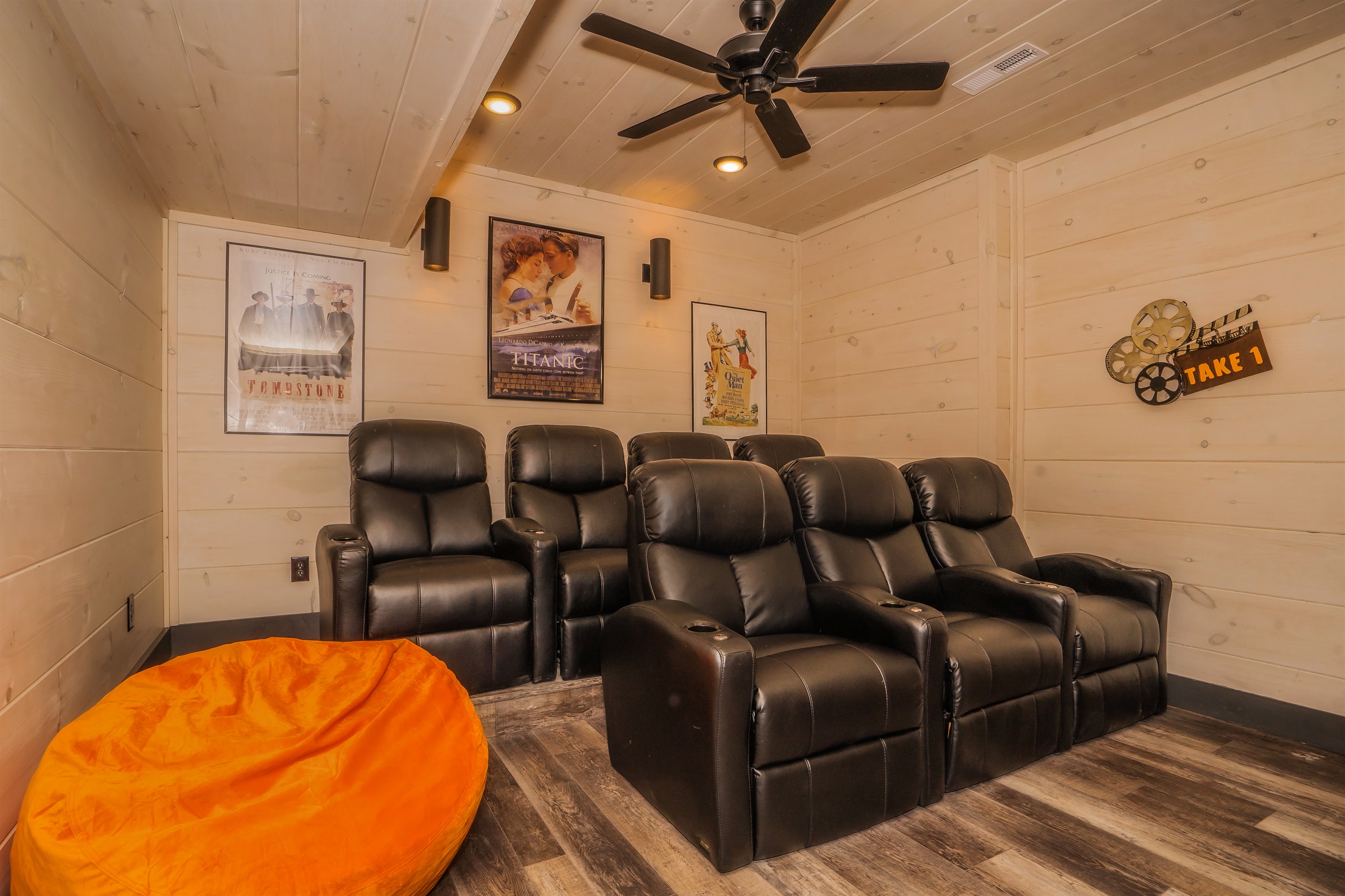 Home theater with leather incliner - perfect for a family movie night!