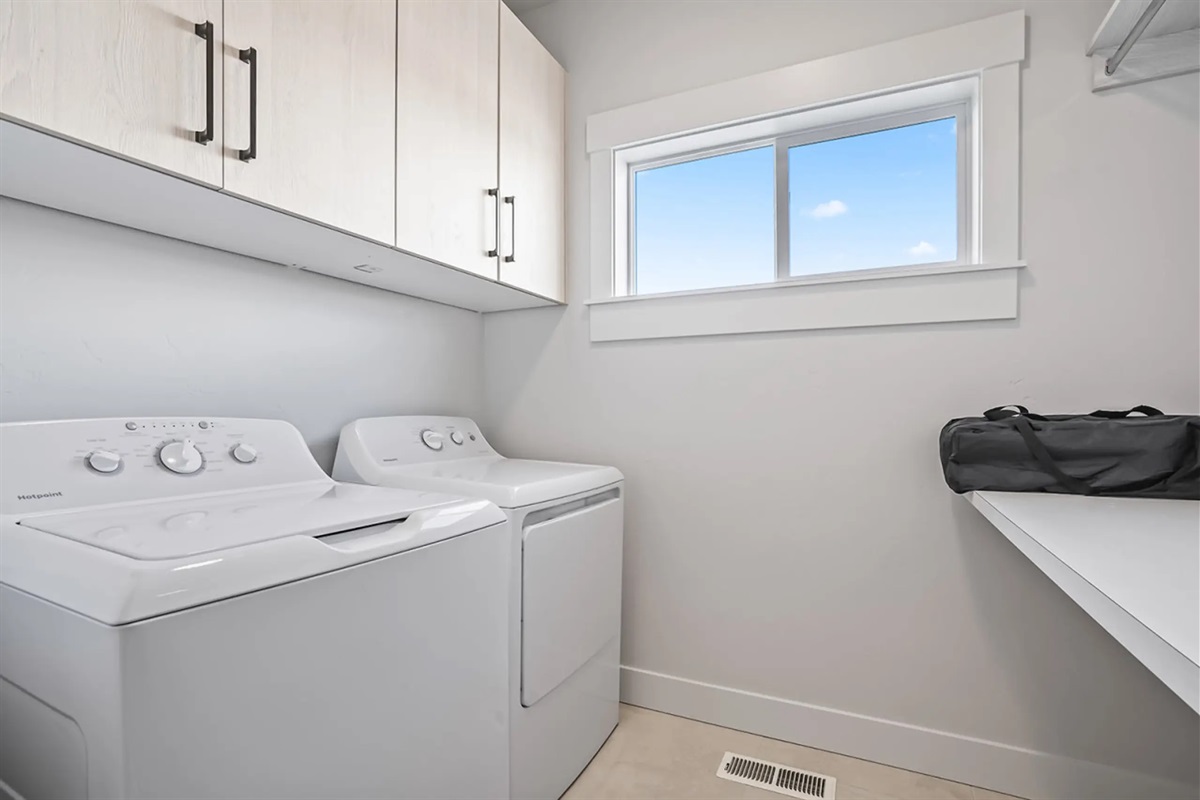 Full washer and dryer included for your convenience.