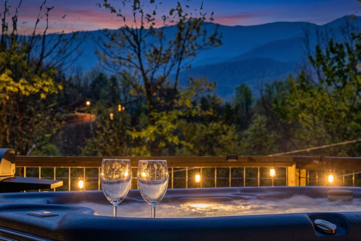 Soak in your private hot tub enjoying the Mountain View