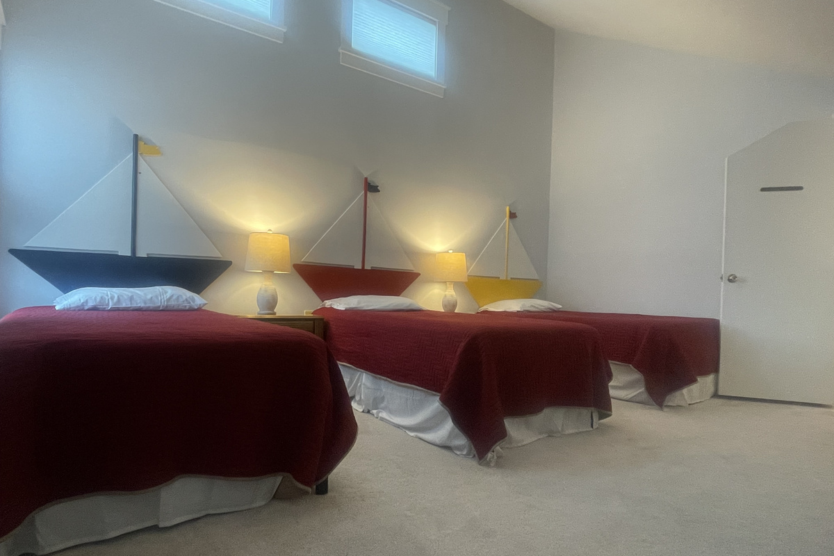 2nd floor bedroom with 3 twin beds