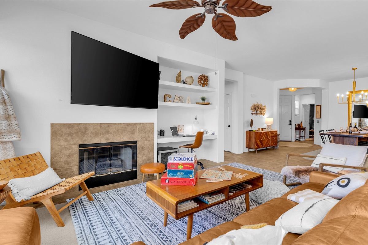 Cozy Nights In Game night is ready! Enjoy classic board games, a warm fireplace, and plush seating.