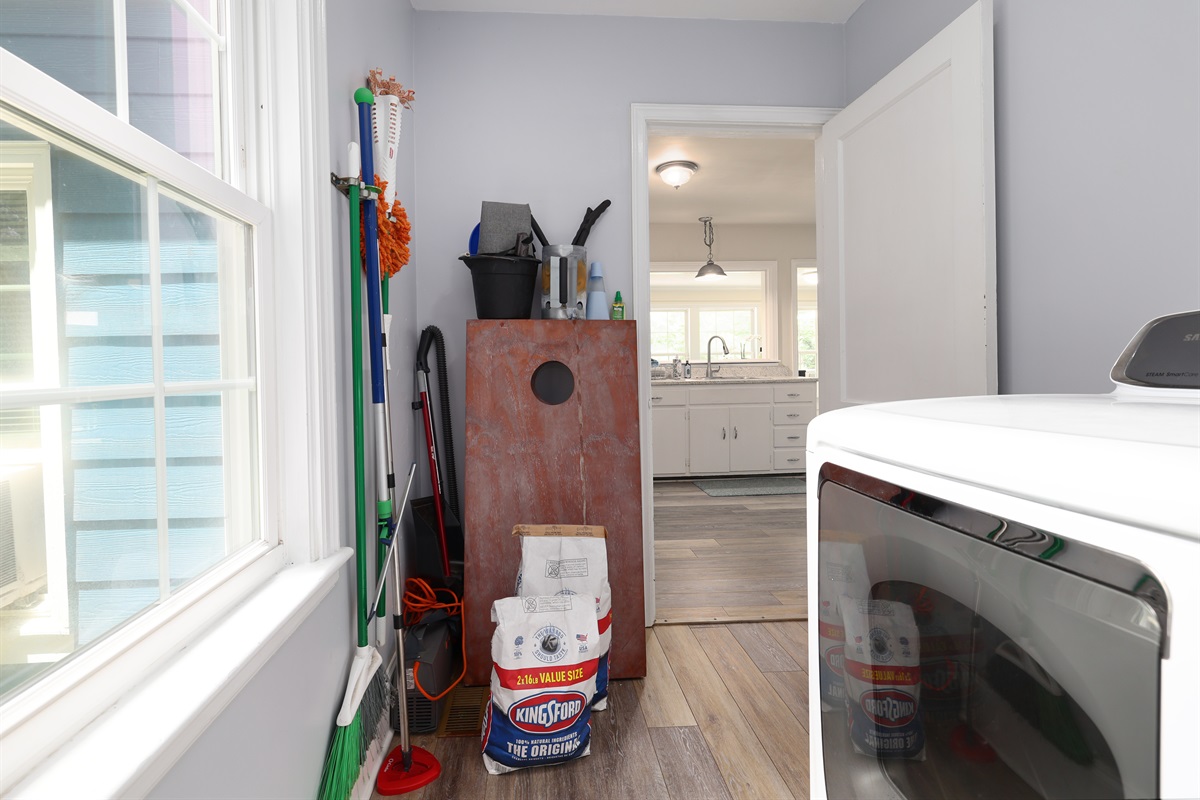 Laundry Room- Charcoal and grill tools, Cornhole
