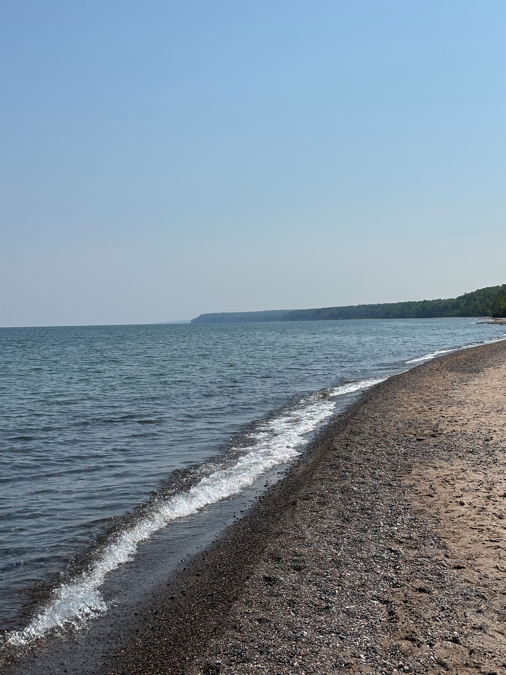 The shores of Lake Superior.  Relax beachside on sunny summer days.  Look for the best agate rocks.  Or brave the cold water and go for a swim.  Take my word for it - the water is clear and cold!