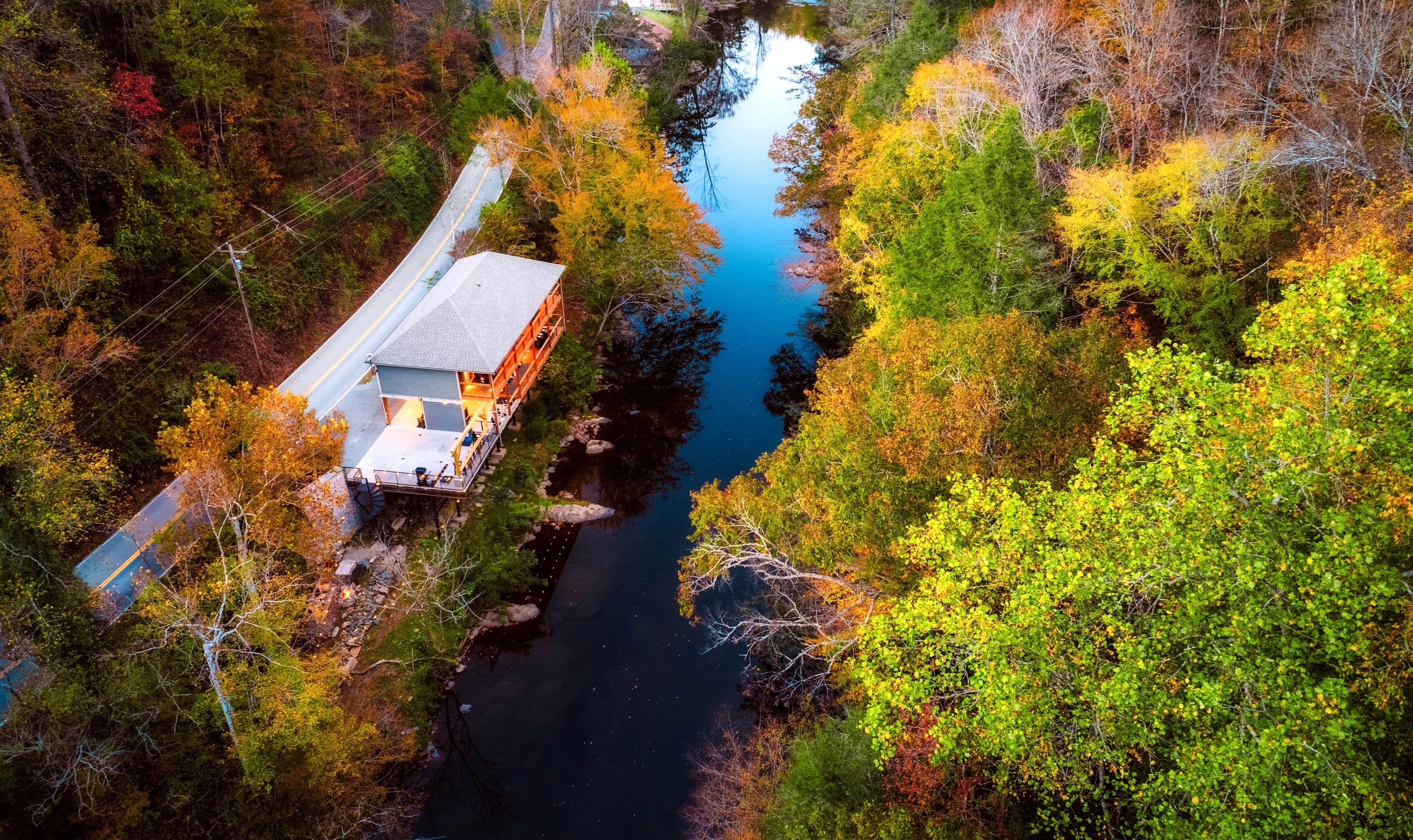 A view from the above. Our cabin is perched right above the famous "Little Pigeon River" in Gatlinburg: "Take Me to the River" Cabin. TUBES/FLOATS ARE NOT PROVIDED. NO LIFEGUARD ON DUTY. 