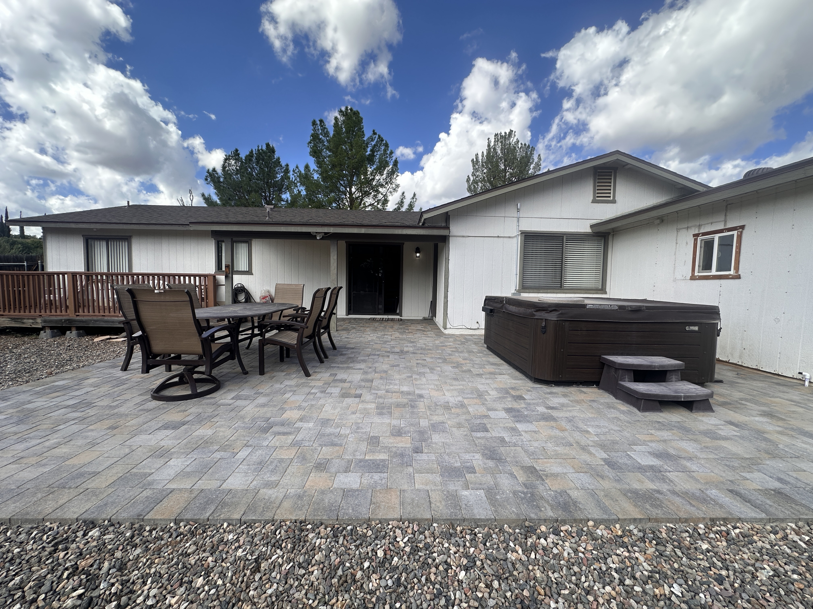Hot tub & extended paver patio installed Sept 2026
